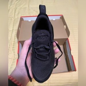 Selling a pair of kids nike air black shoes size 12.5c shoes